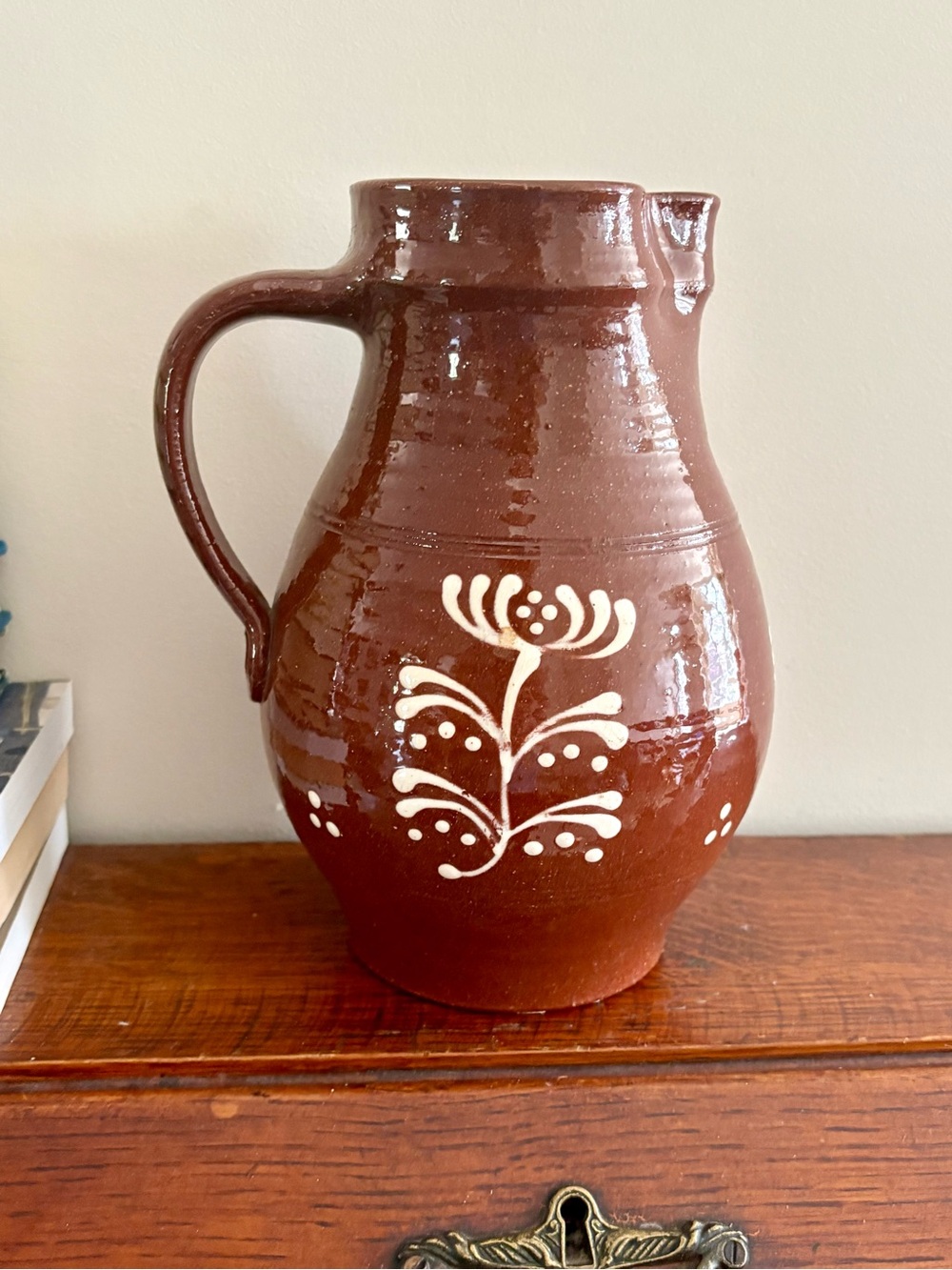 Hand-Painted Rustic Brown Ceramic Pitcher with White Floral Motif - Signed